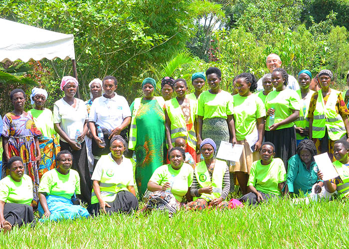 Claus Ollerking posing for a photo with MUWOFA Members.